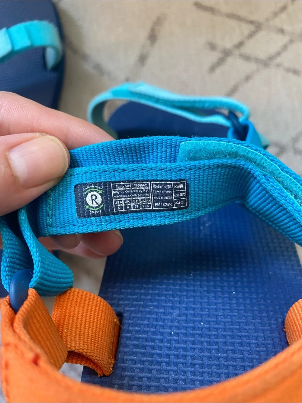 Teva Kids Navy and Turquoise Sandals with Orange Accents